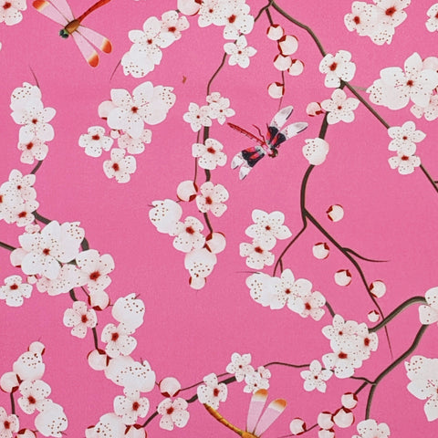 White flower blossoms and dragon flies on pink background.