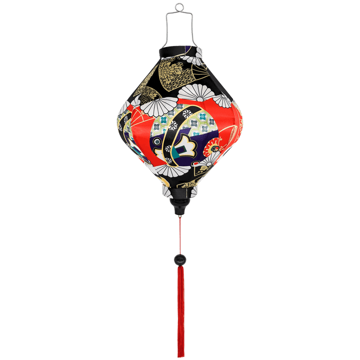 Lozenge shaped Vietnamese lantern with abstract print in red, black, blue and gold outline.