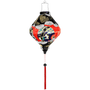 Lozenge shaped Vietnamese lantern with abstract print in red, black, blue and gold outline.