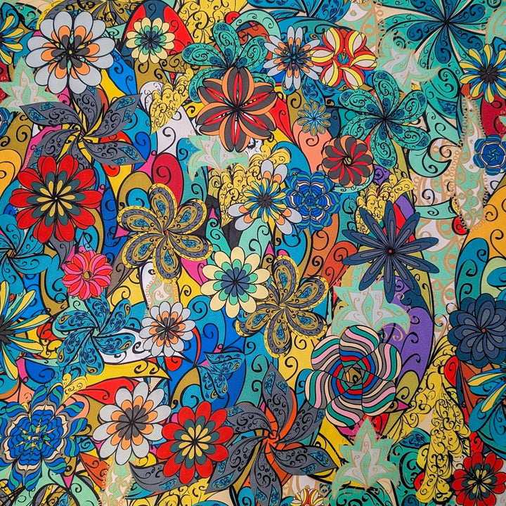 Polyester silk fabric featuring an abstract floral print with intricate swirls and bold hues of blue, red, yellow, and orange.