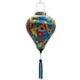 Balloon shape Vietnamese silk lantern featuring an abstract floral print with intricate swirls and bold hues of blue, red, yellow, and orange.