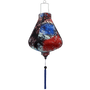 Teardrop shape Vietnamese lantern with silhouette of branches in hues of orange, red, and blue.