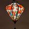 Soft cozy glow created from this Diamond shaped Vietnamese lantern with flamingos and bird of paradise flowers.