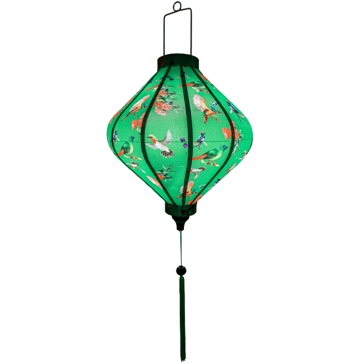 Glowing Lozenge shape lantern with birds on green background.