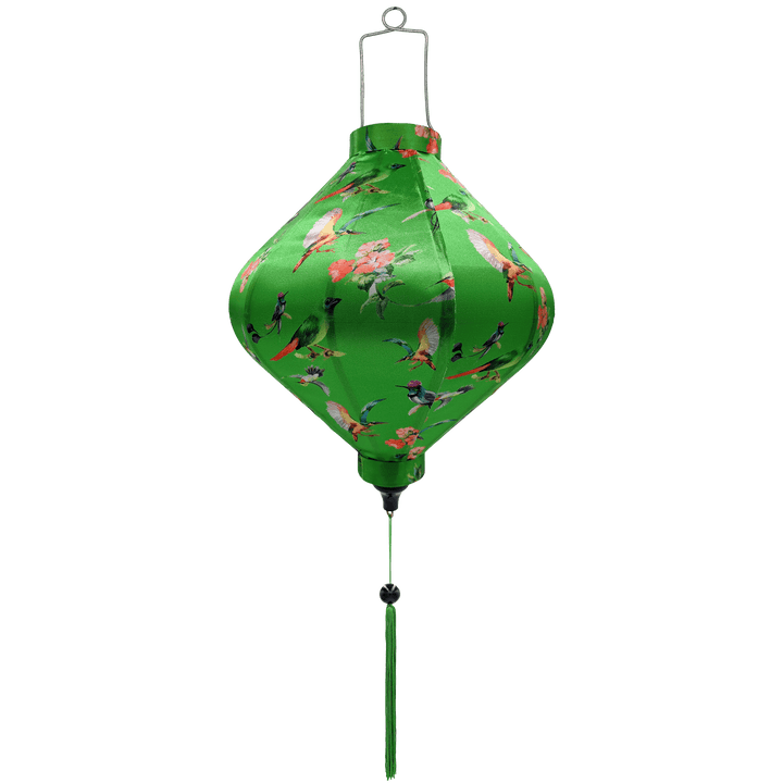 Lozenge shaped lantern with green tassel.
