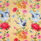 Close up of polyester silk fabric featuring graceful cranes, vibrant chrysanthemums, and delicate dragonflies.