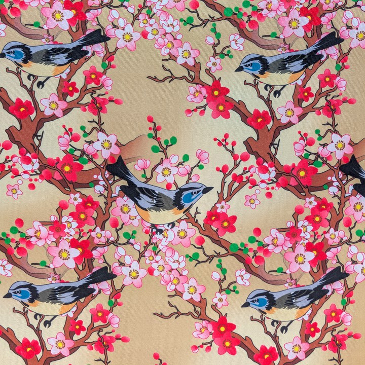 Fabric with a pattern of birds and cherry blossoms on a beige background.