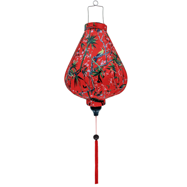 Garlic shaped Hoi An lantern with red tassel and print of Blacknaped Oriole birds perched in a tree with pink flowers.