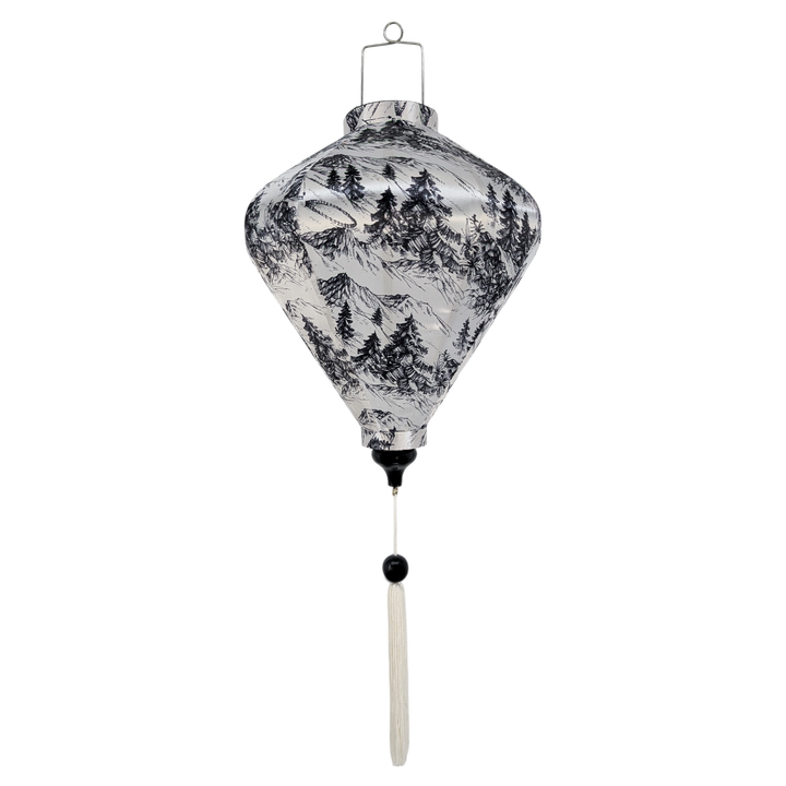 Diamond shaped lantern with black tree pattern on a white background