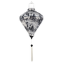 Diamond shaped lantern with black tree pattern on a white background