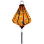 Glowing Vietnamese lantern with blue birds on orange.