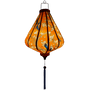 Glowing Vietnamese lantern with blue birds on orange.