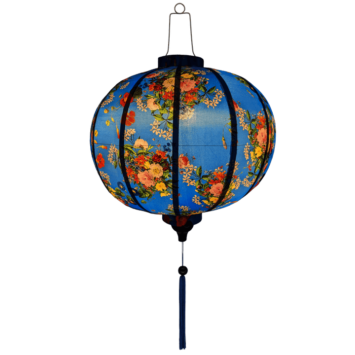 Glowing round lantern with wild flowers against blue.