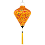 Handmade Vietnamese silk lantern with red floral pattern and blue swallows with yellow tassel on a yellow background
