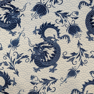Polyester silk fabric used to create Hoi An Vietnamese silk lanterns, featuring blue dragon and floral pattern on a white background