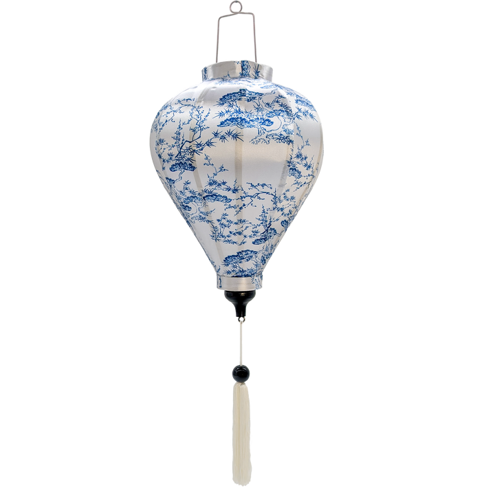 Balloon shape Vietnamese silk lantern with white fabric and blue bonsai tree print bring a serene and tranquil feel, making it a great piece for any room.  Perfect for your space, this Hoi An Lantern is sure to brighten any room.