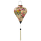Balloon shaped Hoi An Lantern with white tassel featuring bunches of flowers in pink, purple, and yellow on a creamy butter background. 