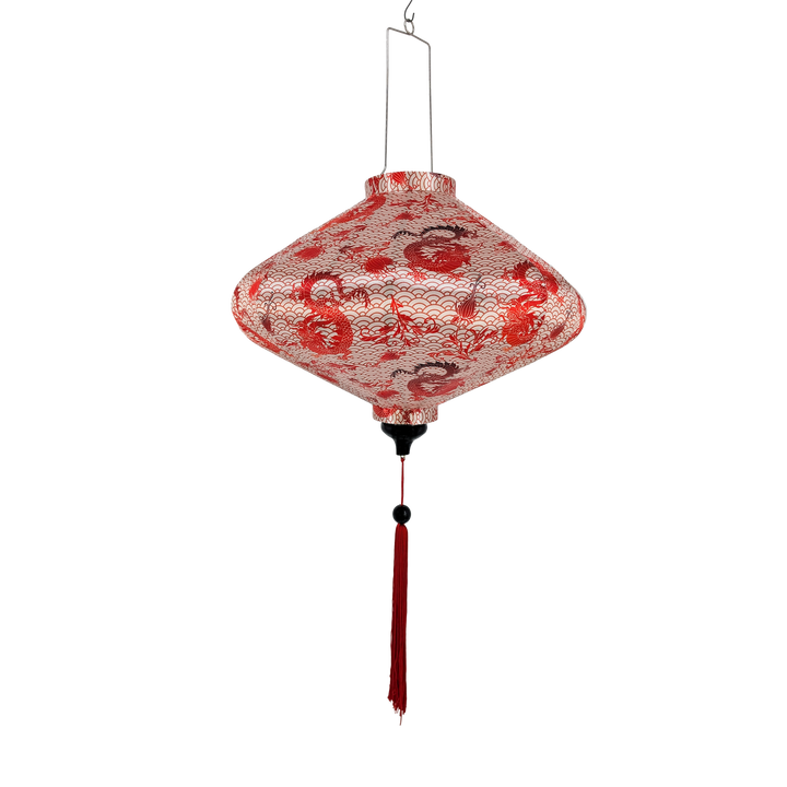 UFO shaped Vietnamese silk lantern with dragon and floral patterns on a cream background and matching red tassel