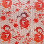 Polyester silk fabric featuring dip dyed burgundy red dragons and flowers on a silk beige background 