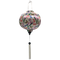Round shaped lantern with white tassel made with bamboo, steel and a print of stunning print of blue, red and green butterflies fluttering around pink and purple flowers.