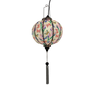 Glowing Round shaped lantern with white tassel made with bamboo, steel and a print of stunning print of blue, red and green butterflies fluttering around pink and purple flowers.