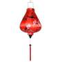 Garlic shaped lantern with red tassel and delicate pink cherry blossoms on red.