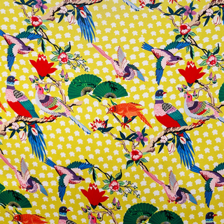 Colorful pattern of birds and flowers on a yellow background
