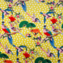 Colorful pattern of birds and flowers on a yellow background
