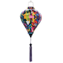 Balloon shaped lantern with purple tassel.