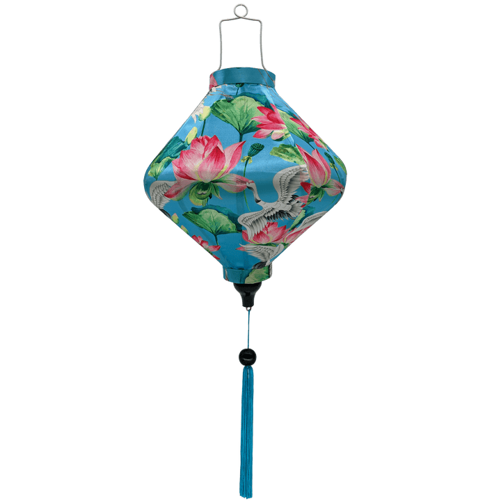 Lozenge shaped Vietnamese lantern with blue tassel and print of cranes and lotus flowers.