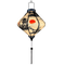 Glowing Lozenge shaped lantern.
