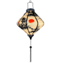 Glowing Lozenge shaped lantern.