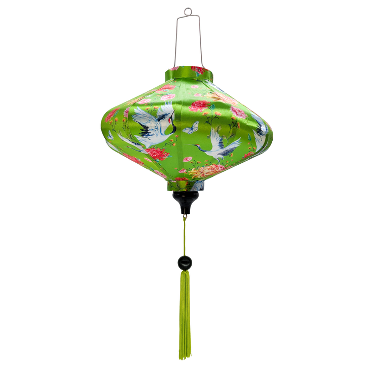 UFO shape Vietnamese silk lantern for sale with green background adorned with elegant white cranes in flight, their wings gracefully spread with black and blue accents. Surrounding them are lush chrysanthemums in shades of red, pink, and yellow, along with delicate roses, small blue butterflies and dragonflies.