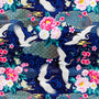 Beautiful polyester silk fabric with a print of white cranes flying amidst a dark blue background of geometric shapes, flowers, and golden clouds used to created Vietnamese Hoi An Lanterns.
