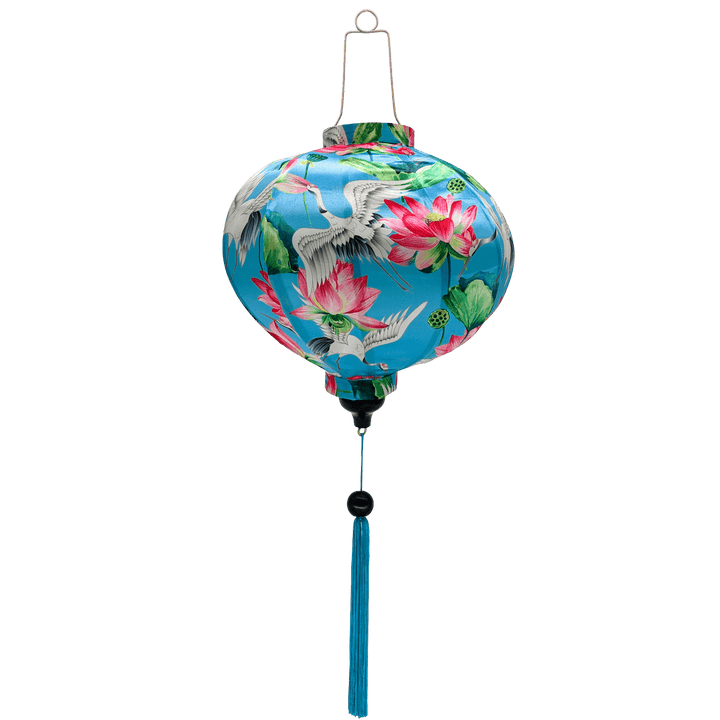 Round shaped Vietnamese lantern with blue tassel and print of cranes and lotus flowers.