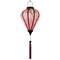 Glowing balloon shaped lantern with pink tassel.
