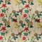 Polyester silk fabric used to create handmade Hoi An Lanterns featuring delicate flowers against creamy background.