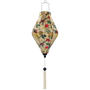 Tube shaped Hoi An Lantern featuring delicate flowers against creamy background with white tassel.
