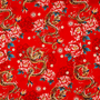 Polyester silk fabric with golden dragons and large pink chrysanthemums with teal leaves used for creating Vietnamese hand made lanterns in Hoi An.