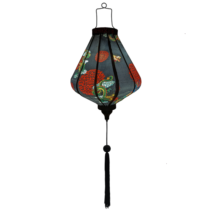 Glowing handcrafted Teardrop shaped Vietnamese lantern with green and blue dragons on a black.