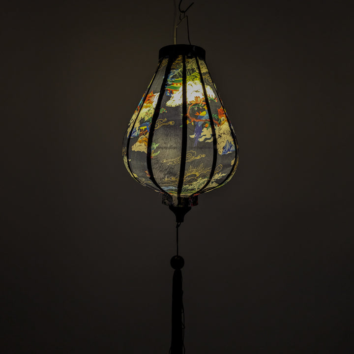 Garlic shape hanging lantern with intricate designs against a dark background