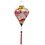 Vibrant balloon shaped lantern with red tassel, intricate floral, fan, and lantern designs, handcrafted in Hoi An for elegant lighting.

