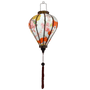 Glowing balloon shaped lantern perfect for cozy interiors.
