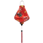 Teardrop shaped Vietnamese lantern with red tassel and design of yellow fans, a house overlooking trees beneath snow capped mountains and surrounded by blooms of pink on a brilliant red background. 