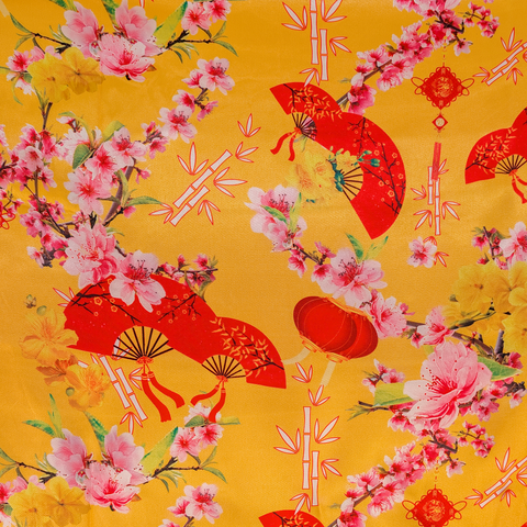 Decorative fabric pattern with red fans, pink flowers, and bamboo on a yellow background