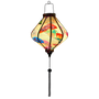 Lozenge shaped glowing lantern with quirky fans shaped in diverse styles and colours, seamlessly set against a captivating cream backdrop. 