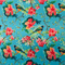 Polyester silk fabric with finches perched in a hibiscus tree filled with pink and peach colour flowers in bloom on blue background used to create Hoi An Vietnamese silk lanterns.