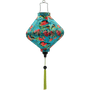 Lozenge shaped Vietnamese lantern with green tassel.