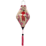 Tube shaped Vietnamese lantern with firecrackers, pink blossoms and pink tassel.
