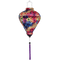 Balloon shaped lantern with fireworks display print and purple tassel.